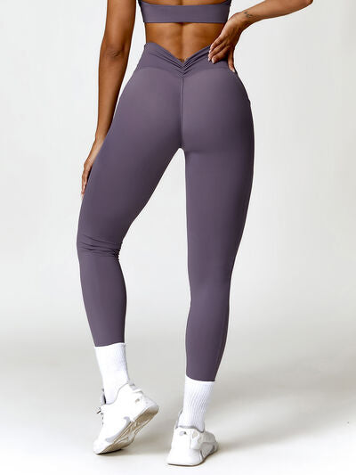 Ruched Pocketed High Waist Active Leggings - Sufyaa